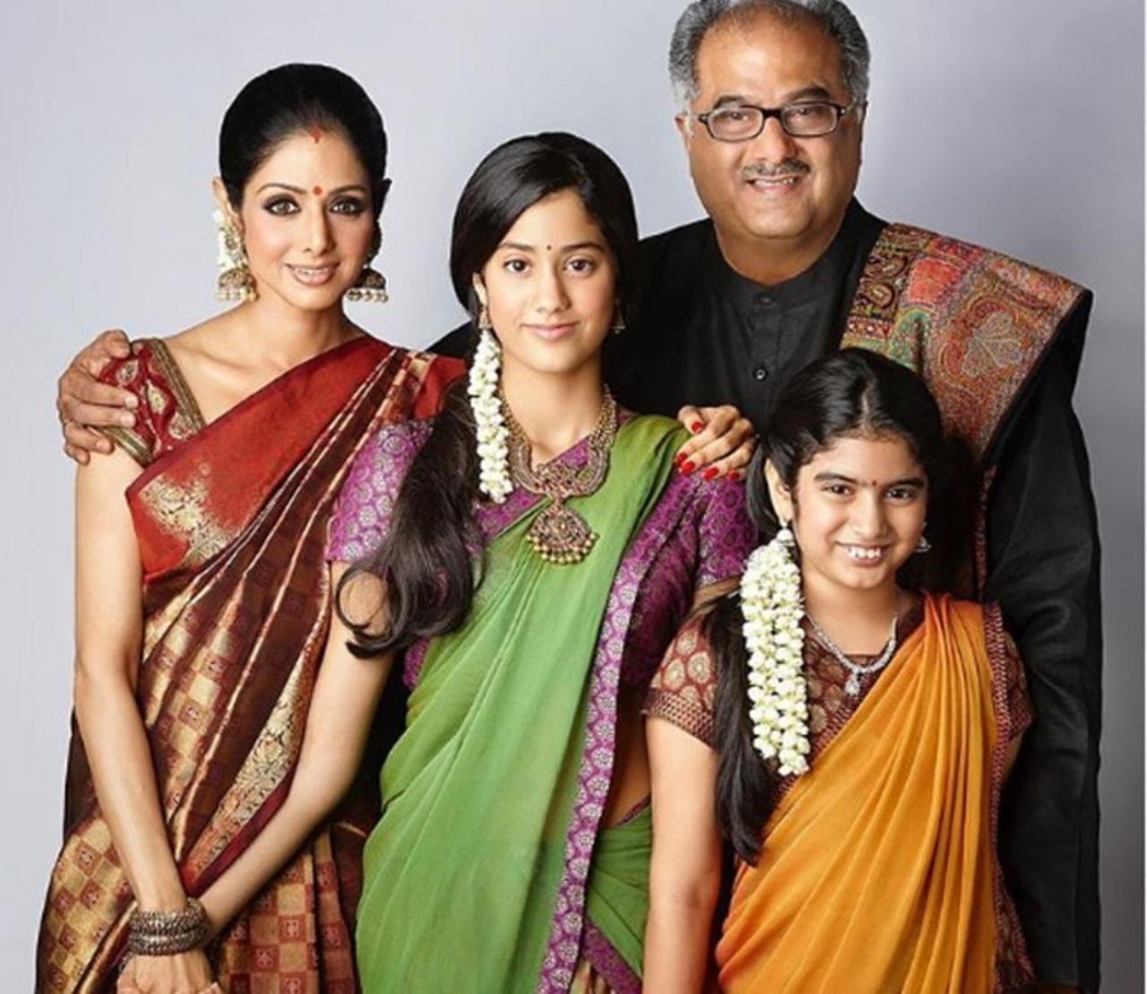 Seems like Janhvi's love for half sarees goes way back to her childhood days. Here she is seen posing with her late mother Sridevi, siste Khushi and father Boney Kapoor